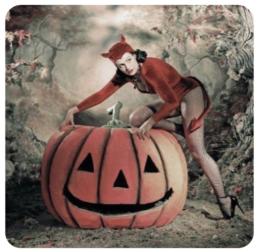 Une diablesse perchée sur une citrouille géante — Halloween vintage